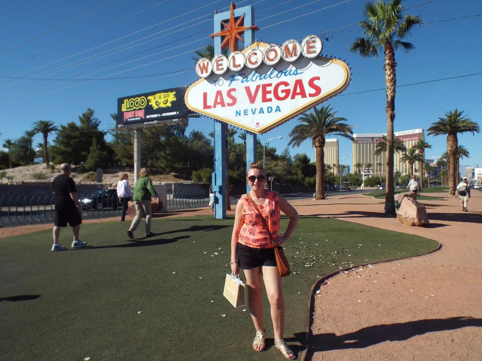 Sam standing in front of the Welcome to Fabulous Las Vegas sign